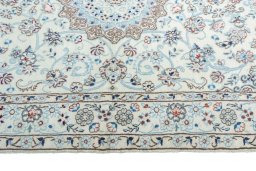 Corner detail of New Nain rug showing border pattern and Cork pile