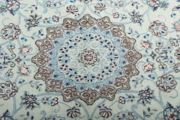Central medallion detail of New Nain rug from Iran / Persia
