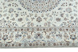 Corner detail of New Nain rug showing border pattern and Wool pile