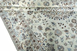 Close-up detail of New Nain rug from Iran / Persia showing Wool weave