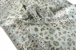 Surface texture of New Nain rug with natural Wool and intricate pattern