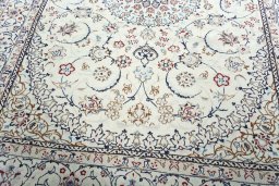 Close-up detail of 2000s Nain rug from Iran / Persia showing Wool weave