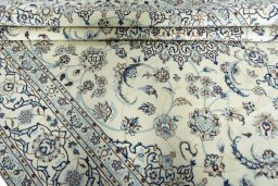Close-up detail of 2000s Nain rug from Iran / Persia showing Wool weave