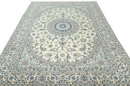 Surface texture of 2000s Nain rug with natural Wool and intricate pattern