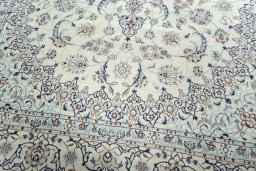 Close-up detail of 2000s Nain rug from Iran / Persia showing Wool weave