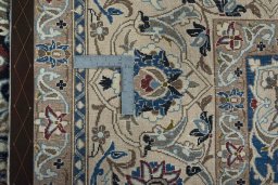 Backside of handmade 2000s Nain rug showing knot structure and weave density