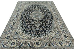 Surface texture of 2000s Nain rug with natural Wool and intricate pattern