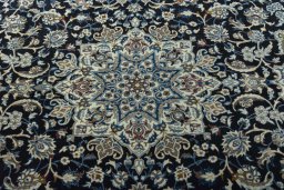 Central medallion detail of 2000s Nain rug from Iran / Persia