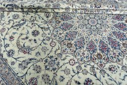 Close-up detail of New Nain rug from Iran / Persia showing Silk weave