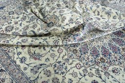 Surface texture of New Nain rug with natural Silk and intricate pattern