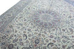Backside of handmade New Nain rug showing knot structure and weave density