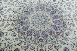 Central medallion detail of New Nain rug from Iran / Persia