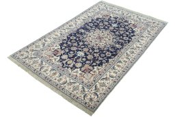 Corner detail of New Nain rug showing border pattern and Cork pile