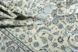 Surface texture of New Nain rug with natural Wool and intricate pattern