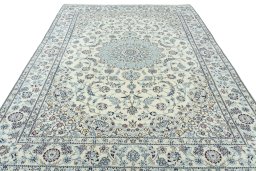 Surface texture of New Nain rug with natural Wool and intricate pattern