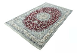 Corner detail of New Nain rug showing border pattern and Cork pile