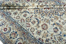 Close-up detail of 2000s Nain rug from Iran / Persia showing Wool weave