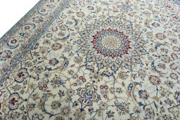 Backside of handmade 2000s Nain rug showing knot structure and weave density