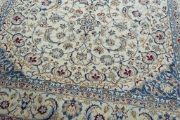 Close-up detail of 2000s Nain rug from Iran / Persia showing Wool weave