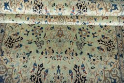 Close-up detail of 2000s Nain rug from Iran / Persia showing Wool weave