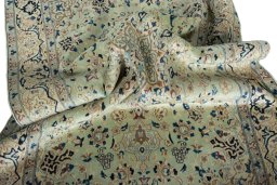 Surface texture of 2000s Nain rug with natural Wool and intricate pattern