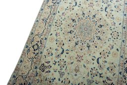 Backside of handmade 2000s Nain rug showing knot structure and weave density
