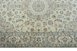 Corner detail of 2000s Nain rug showing border pattern and Wool pile
