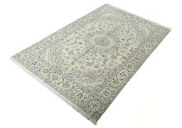 Corner detail of 2000s Nain rug showing border pattern and Wool pile