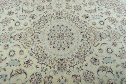 Central medallion detail of 2000s Nain rug from Iran / Persia