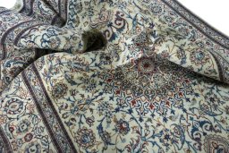 Surface texture of New Nain rug with natural Wool and intricate pattern
