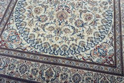 Close-up detail of New Nain rug from Iran / Persia showing Wool weave
