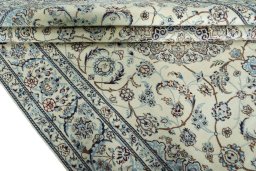 Close-up detail of 2000s Nain rug from Iran / Persia showing Wool weave