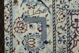 Backside of handmade 2000s Nain rug showing knot structure and weave density