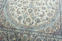 Close-up detail of 2000s Nain rug from Iran / Persia showing Wool weave