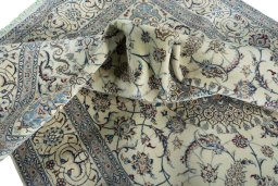 Surface texture of New Nain rug with natural Wool and intricate pattern