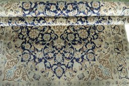 Close-up detail of 2000s Nain rug from Iran / Persia showing Wool weave