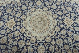 Central medallion detail of 2000s Nain rug from Iran / Persia