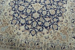 Close-up detail of 2000s Nain rug from Iran / Persia showing Wool weave