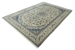 Corner detail of 2000s Nain rug showing border pattern and Wool pile