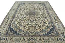 Surface texture of 2000s Nain rug with natural Wool and intricate pattern