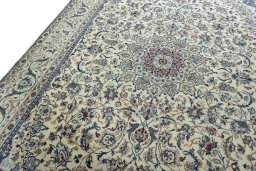 Backside of handmade 2000s Nain rug showing knot structure and weave density