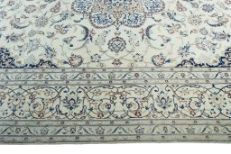 Corner detail of New Nain rug showing border pattern and Wool pile