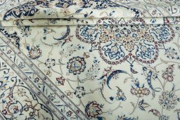 Close-up detail of New Nain rug from Iran / Persia showing Wool weave