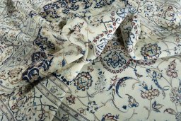 Surface texture of New Nain rug with natural Wool and intricate pattern