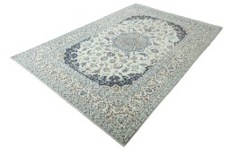 Corner detail of New Nain rug showing border pattern and Wool pile