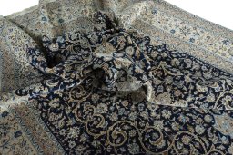 Surface texture of 1970s Nain rug with natural Cork and intricate pattern