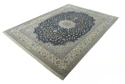 Corner detail of 1970s Nain rug showing border pattern and Cork pile