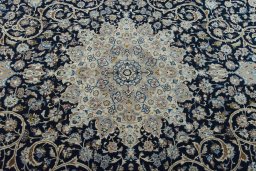 Central medallion detail of 1970s Nain rug from Iran / Persia