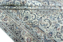 Close-up detail of 2000s Nain rug from Iran / Persia showing Wool weave