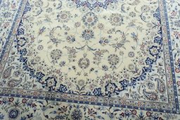 Close-up detail of 2000s Nain rug from Iran / Persia showing Cork weave